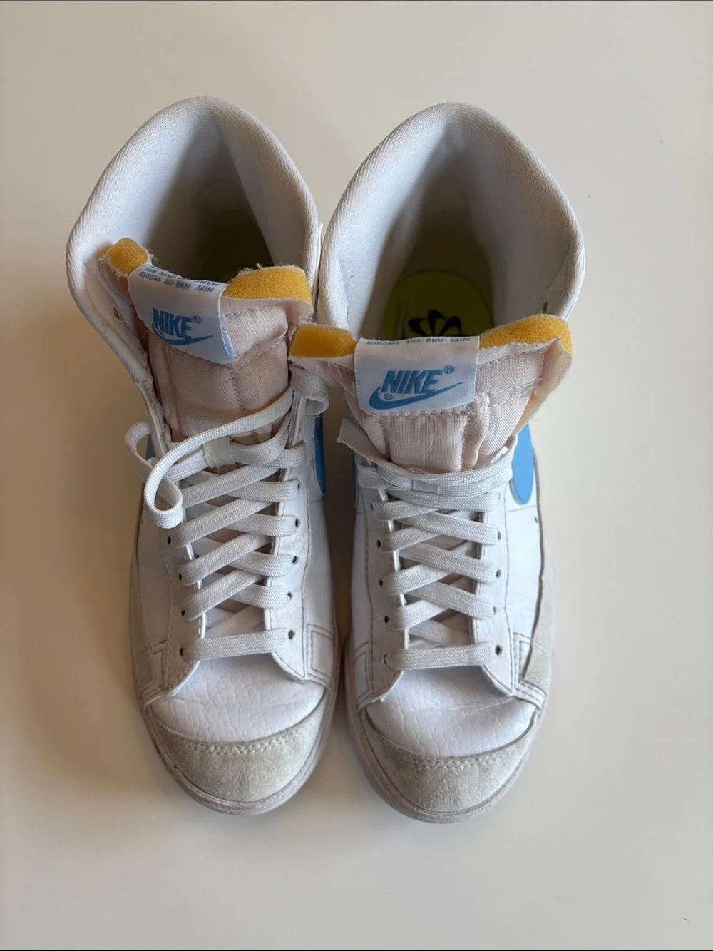 Nike Blazers Women’s High-Top Sneakers in White and Light Blue Swoosh